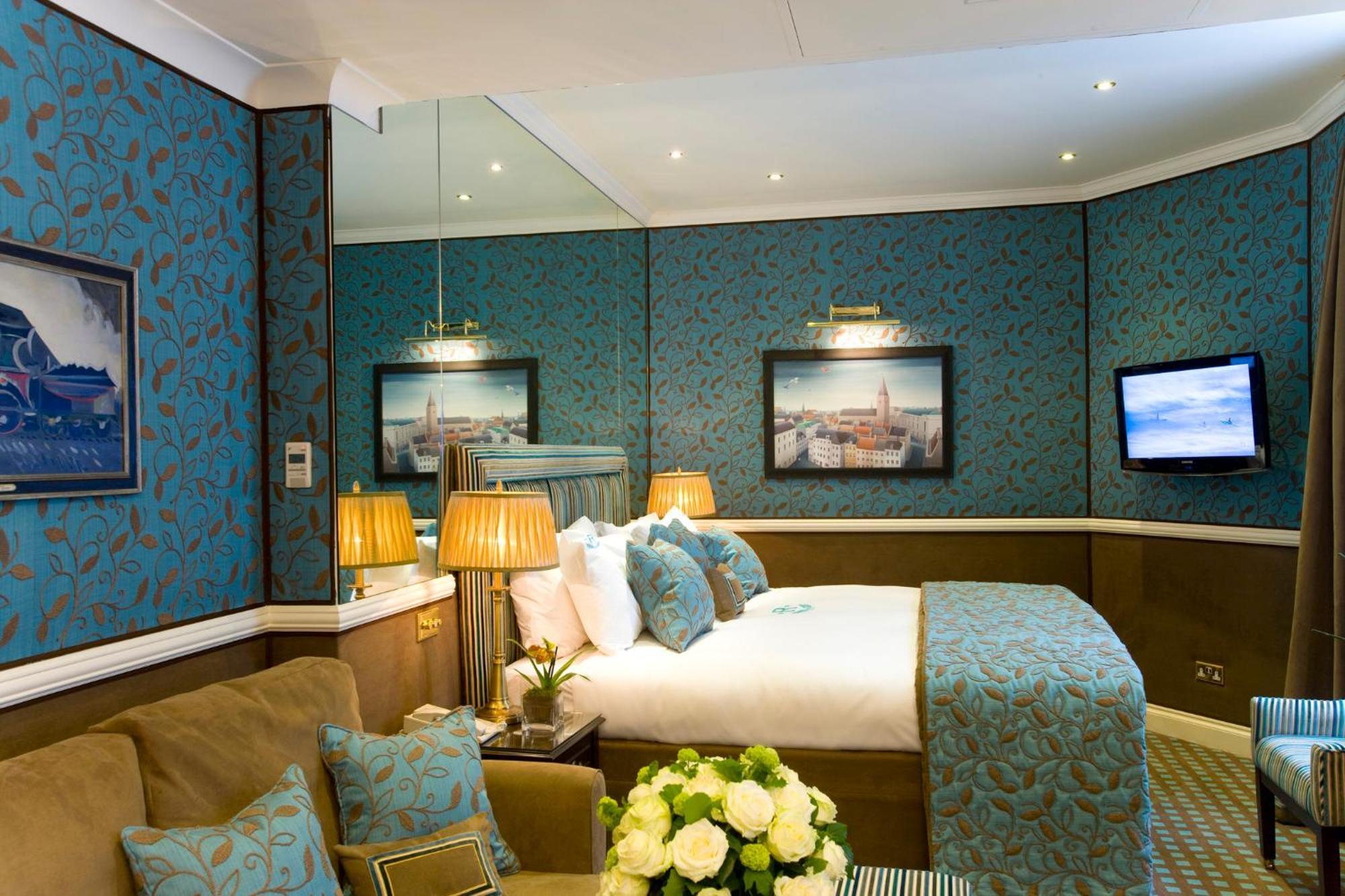 فندق روبنز آت ذا بالاس لندن المظهر الخارجي الصورة A bedroom at the hotel